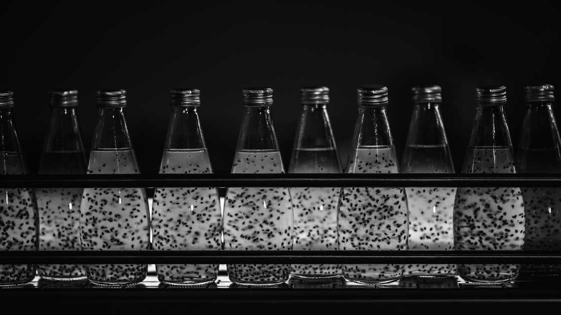 Glass bottles stacked next to each other