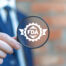 FDA in magnifying glass held by quality and compliance management professional
